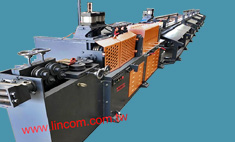 Wire straightening and cutting machine.